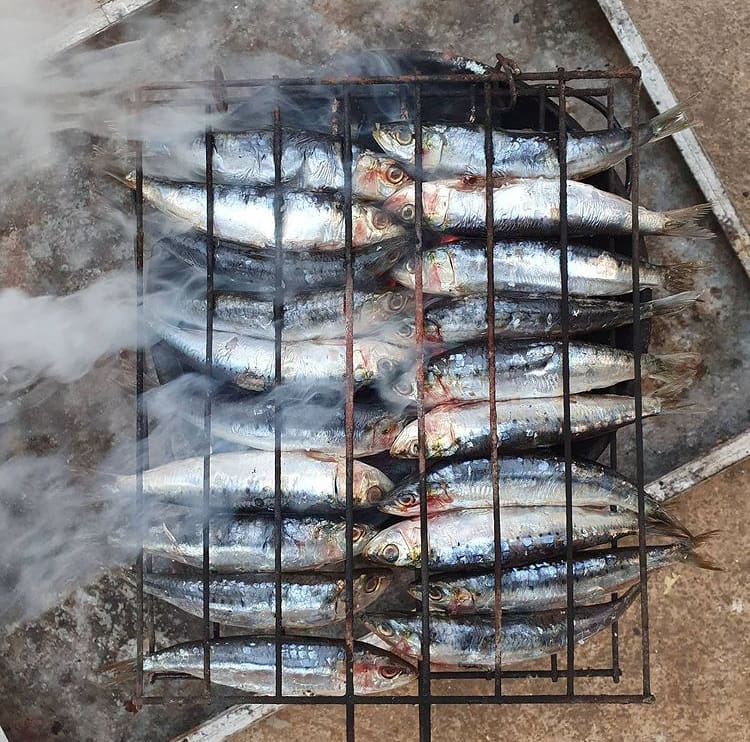 Sardinhas Assadas on the barbeque - Food in portugal