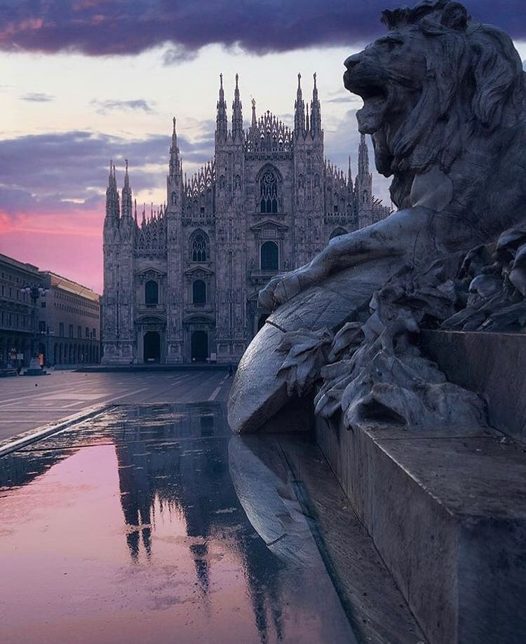 Lion statue in Duomo Square in Milan, Italy