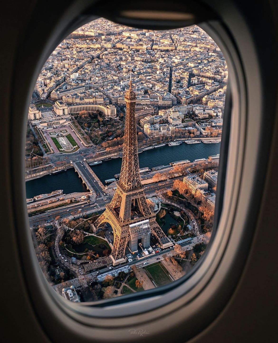 Views of the Eiffel Tower and Paris as seen from an airplane window. 12 Of The Best City Breaks in Europe