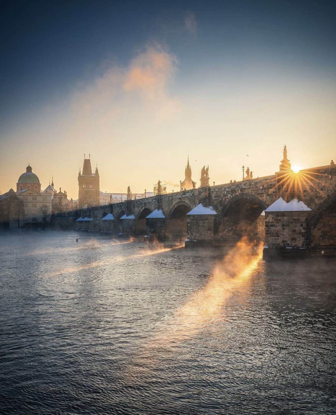 Charles Bridge on a misty morning - 12 Of The Best City Breaks in Europe