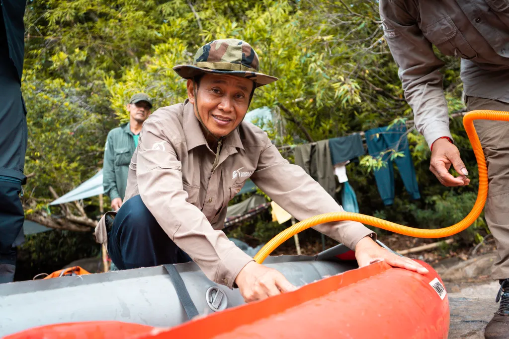 Conservationist Sam Han readies his kayak