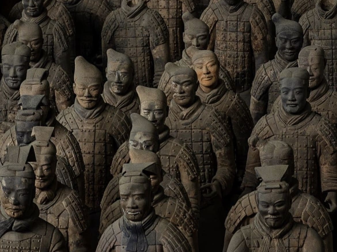 Under the light and shadows, you can see how different each individual terracotta warrior is