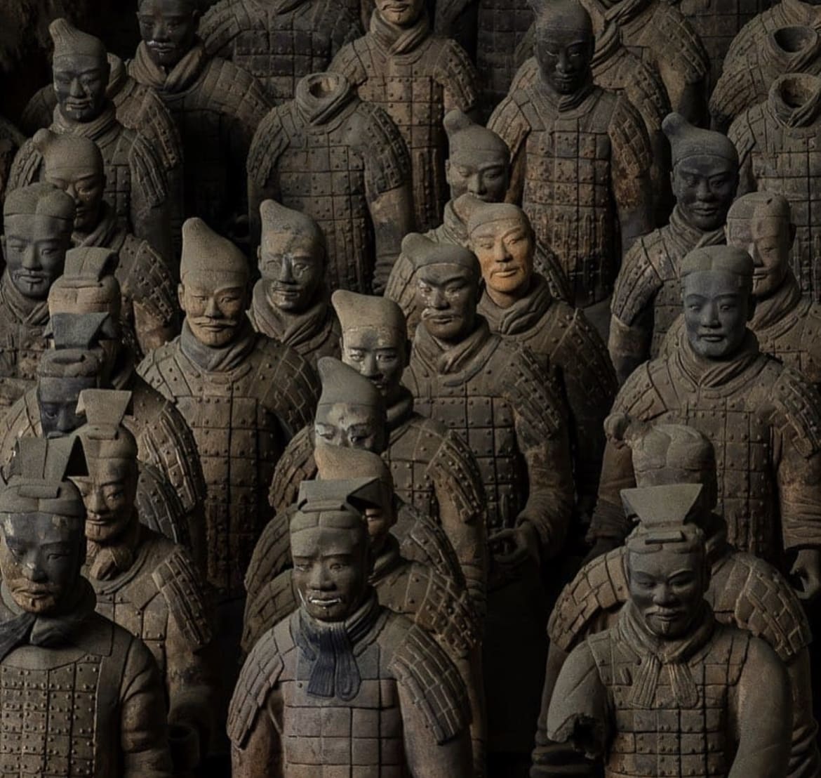Under the light and shadows, you can see how different each individual terracotta warrior is