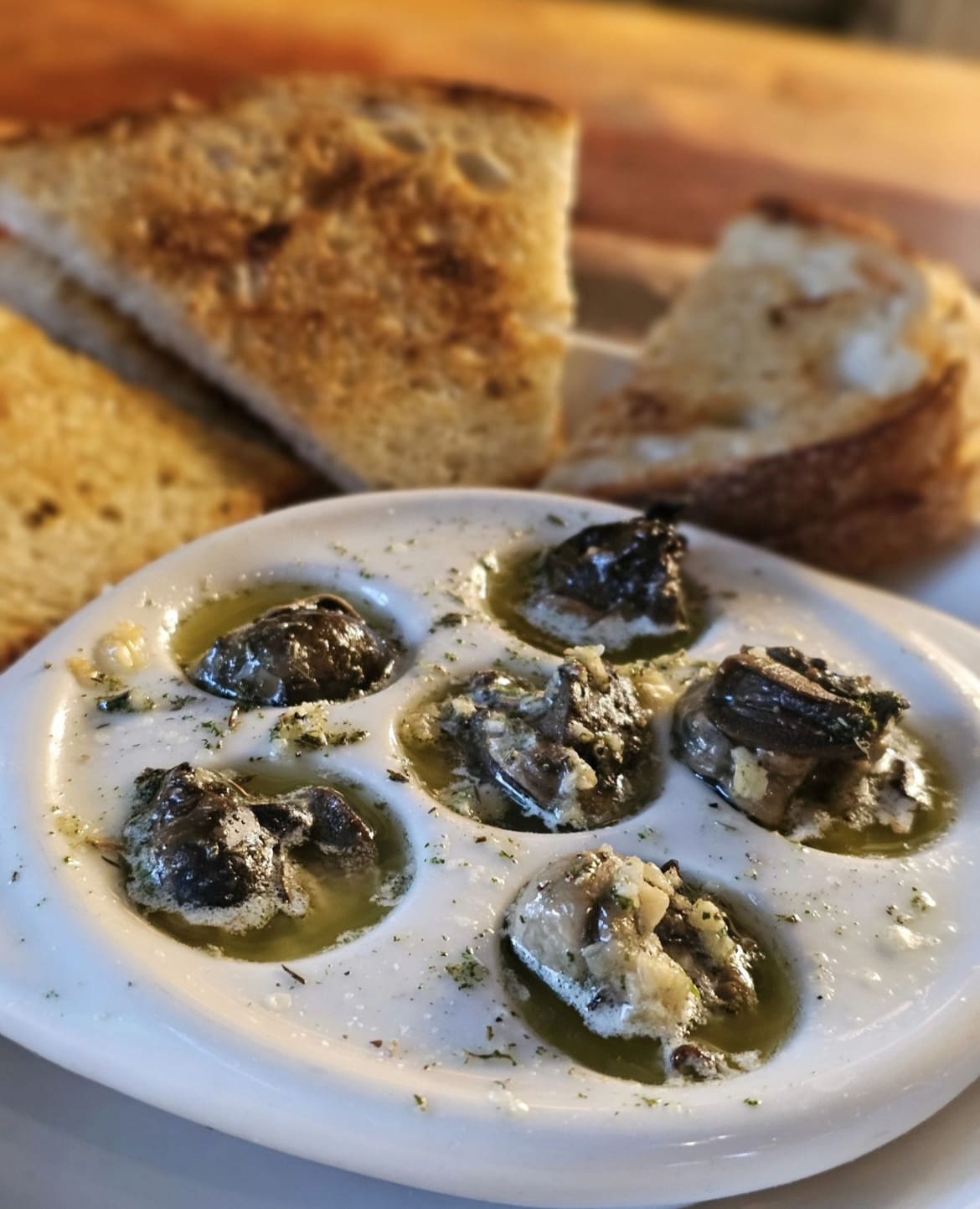 Escargot with butter and garlic sauce